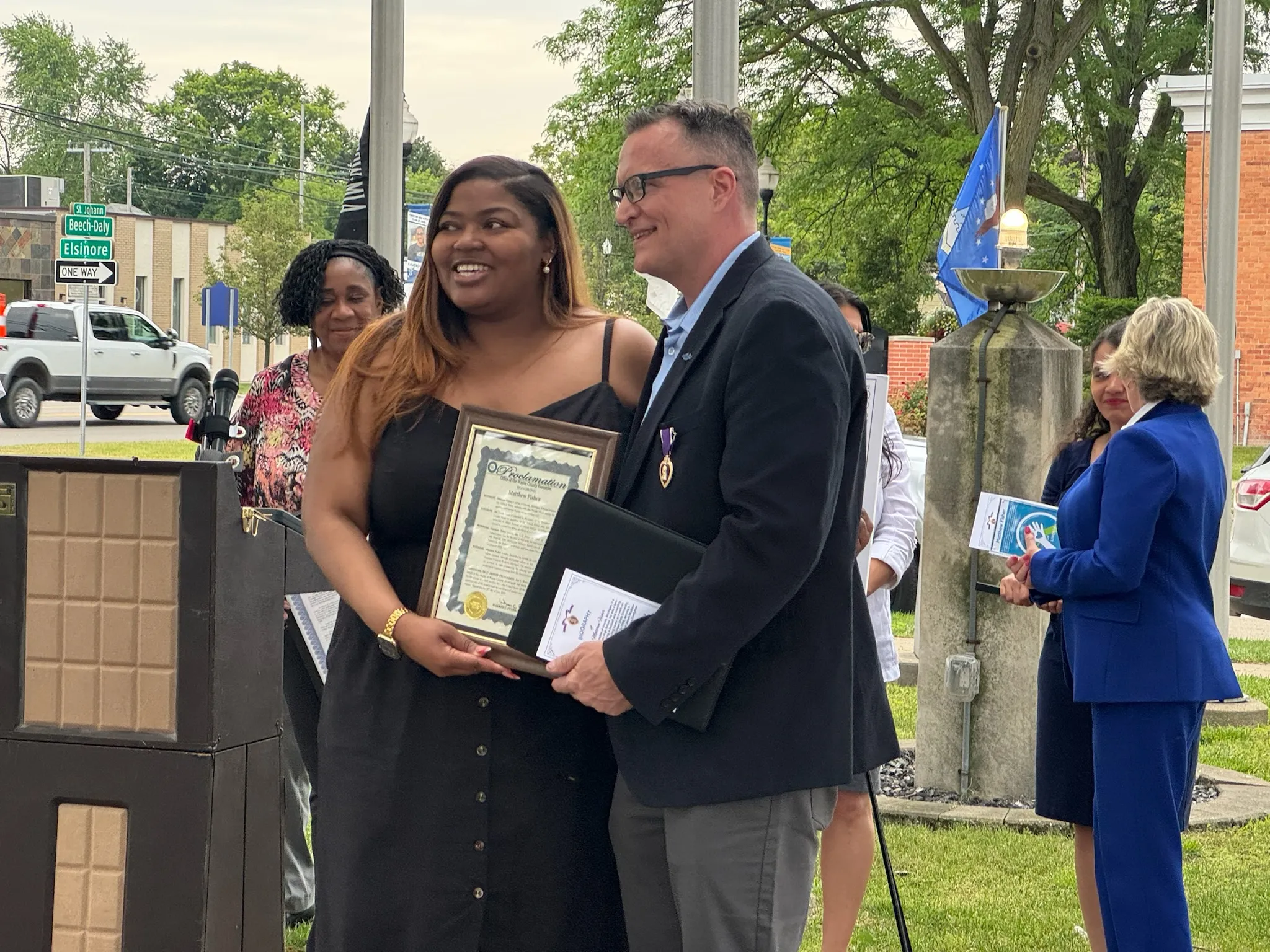 Kimberly Fisher receiving a proclamation